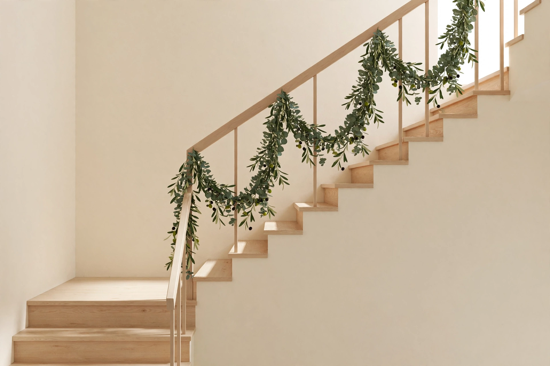 Minimal staircase with a simple eucalyptus garland